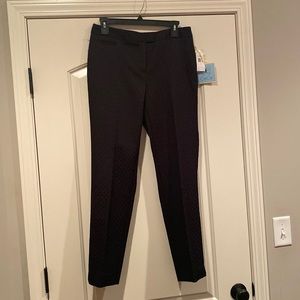 Black patterned pants.